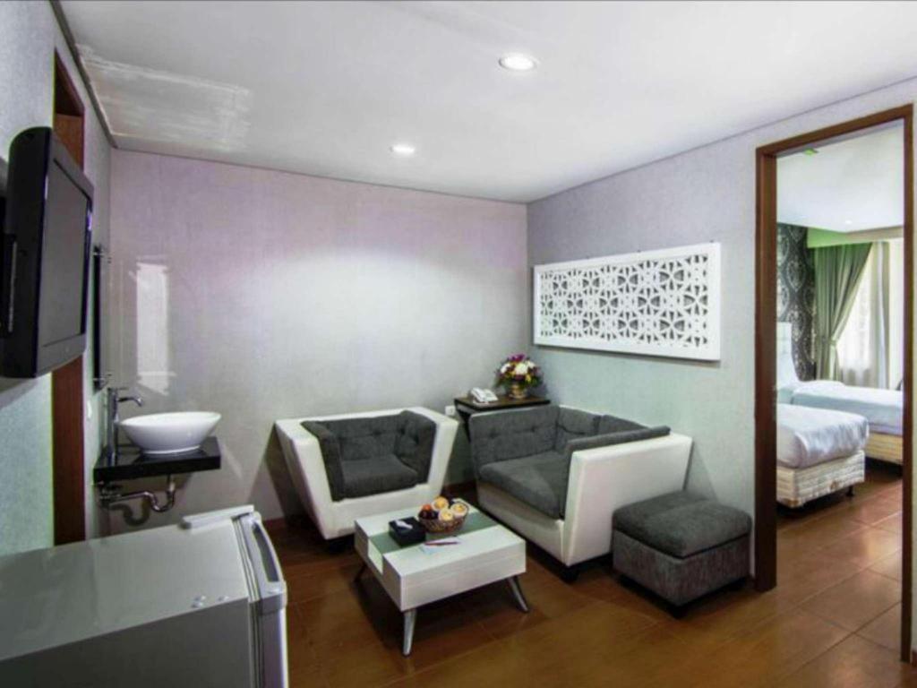The Rizen Hotel Чисаруа Экстерьер фото