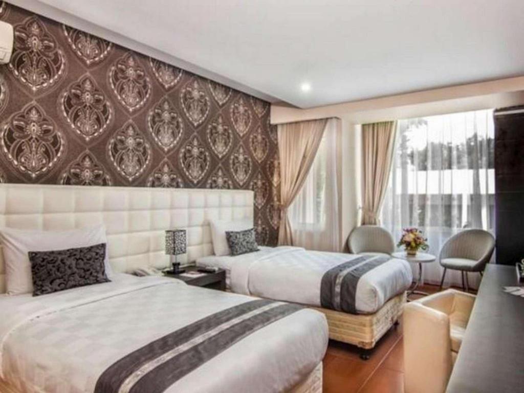 The Rizen Hotel Чисаруа Экстерьер фото