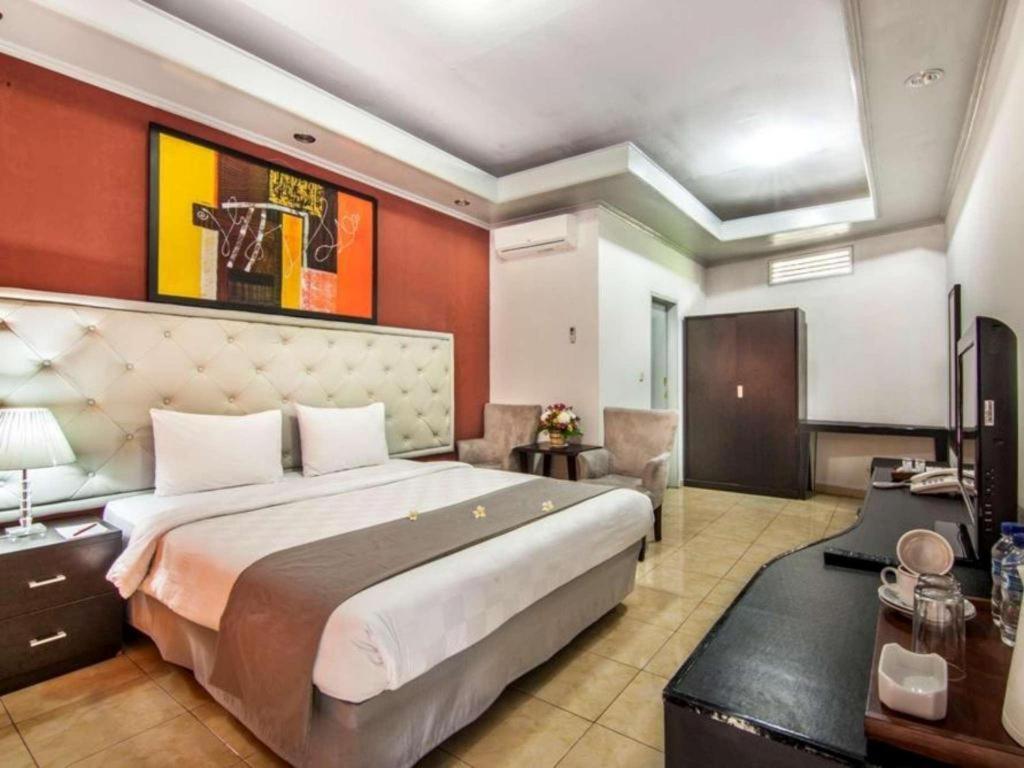 The Rizen Hotel Чисаруа Экстерьер фото