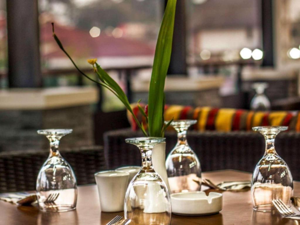 The Rizen Hotel Чисаруа Экстерьер фото