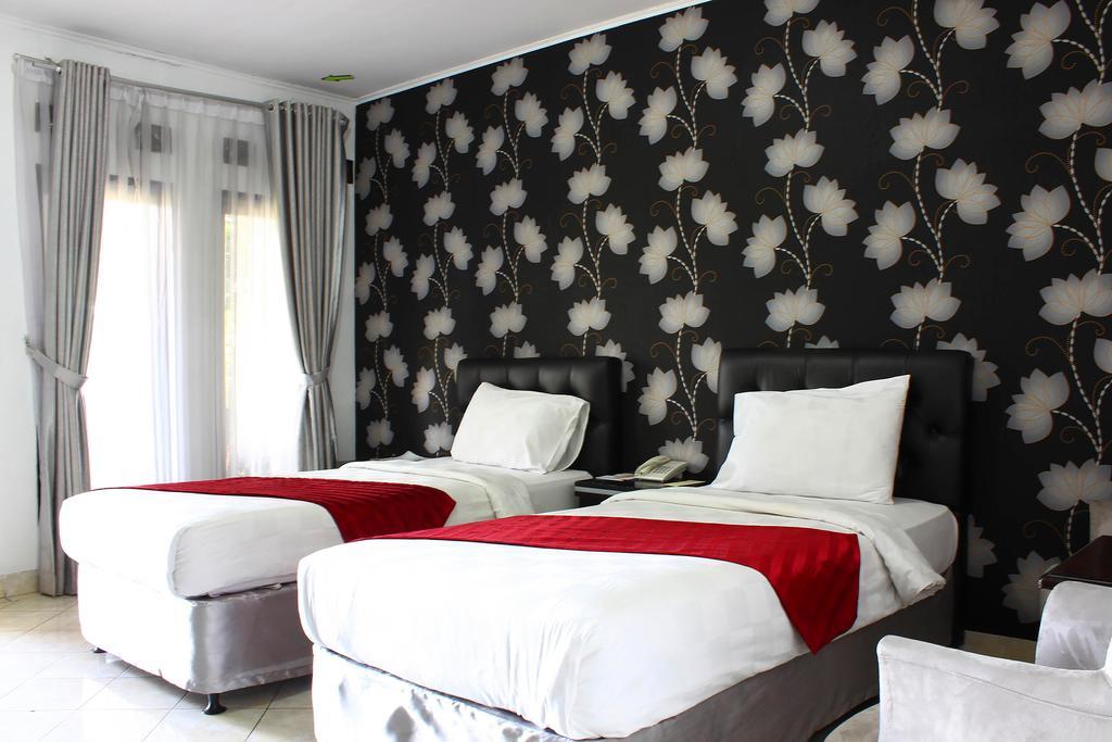 The Rizen Hotel Чисаруа Экстерьер фото