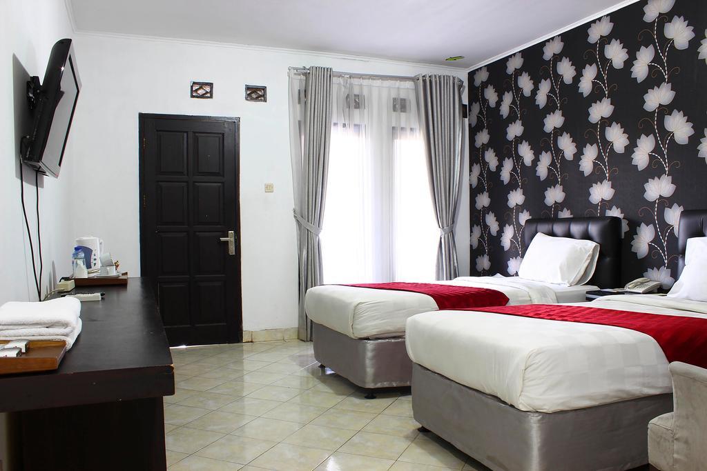 The Rizen Hotel Чисаруа Экстерьер фото