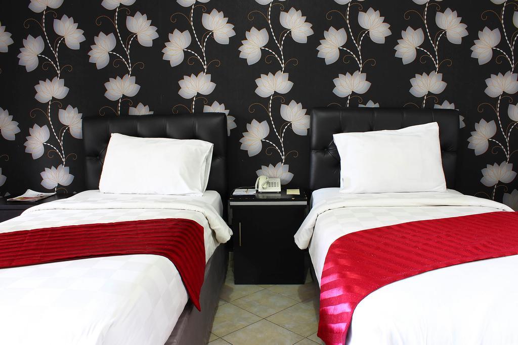 The Rizen Hotel Чисаруа Экстерьер фото